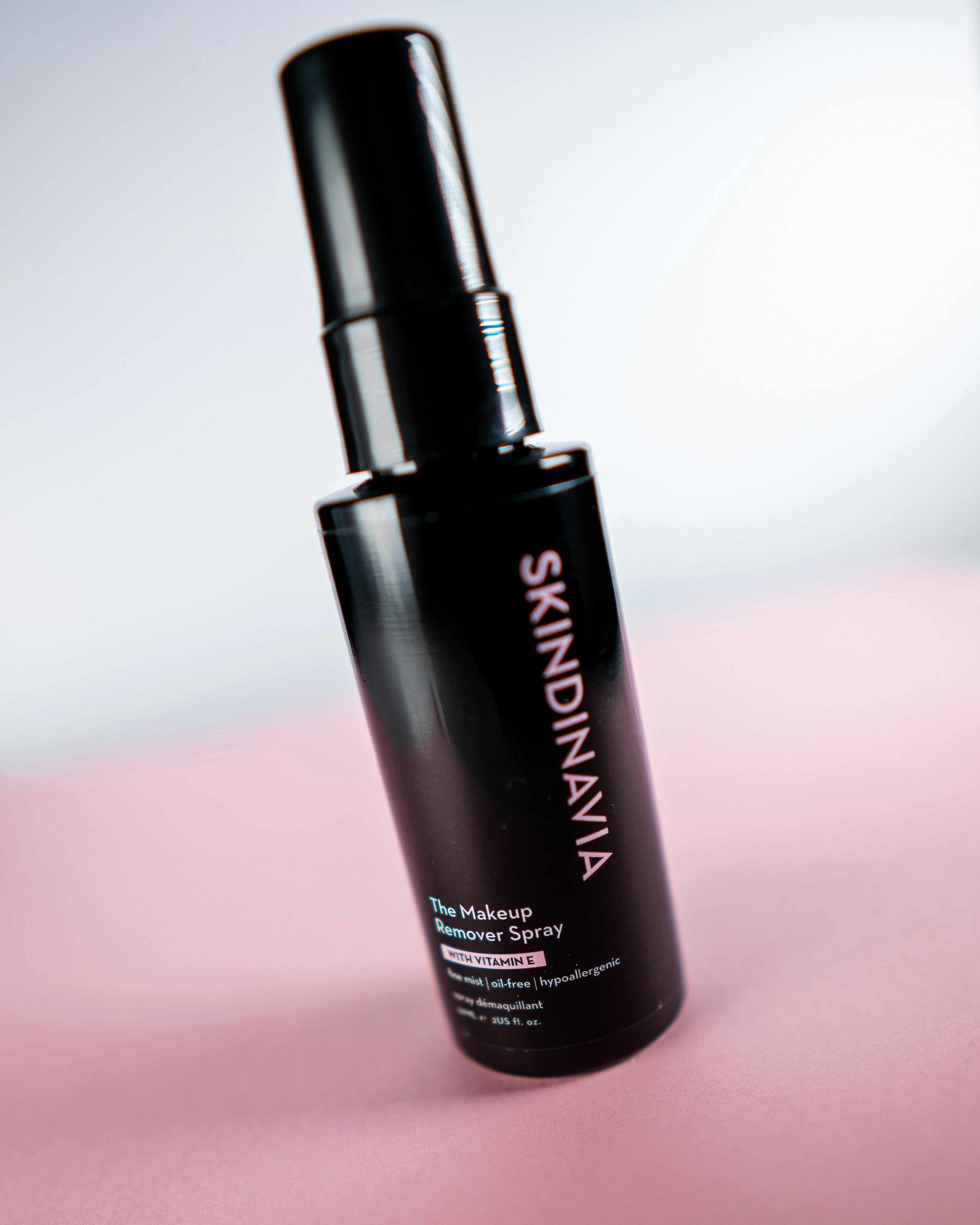 Skindinavia Makeup Remover in a black bottle.