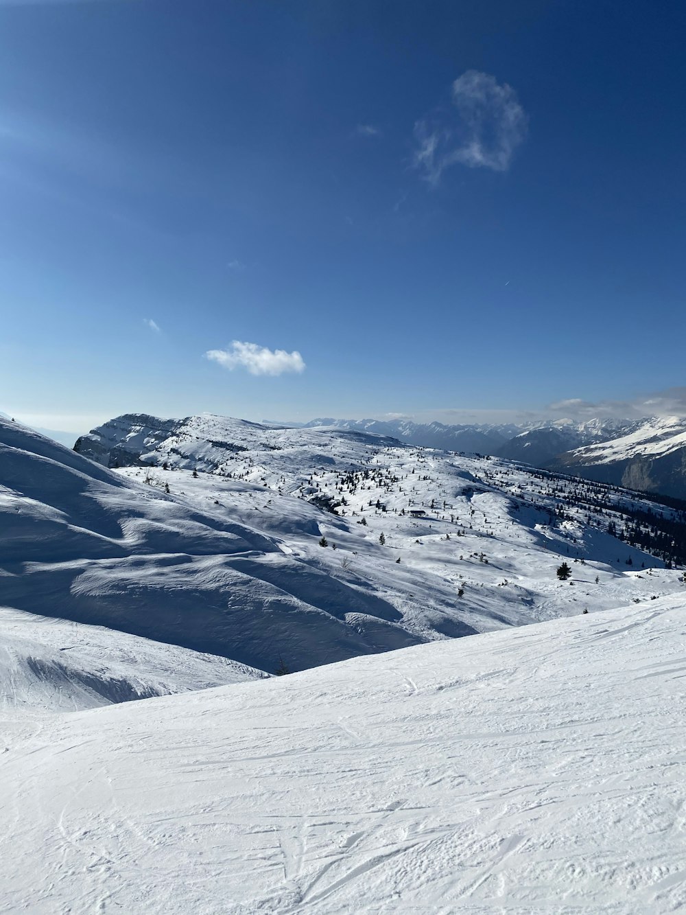 snow covered mountain under blue sky during daytime