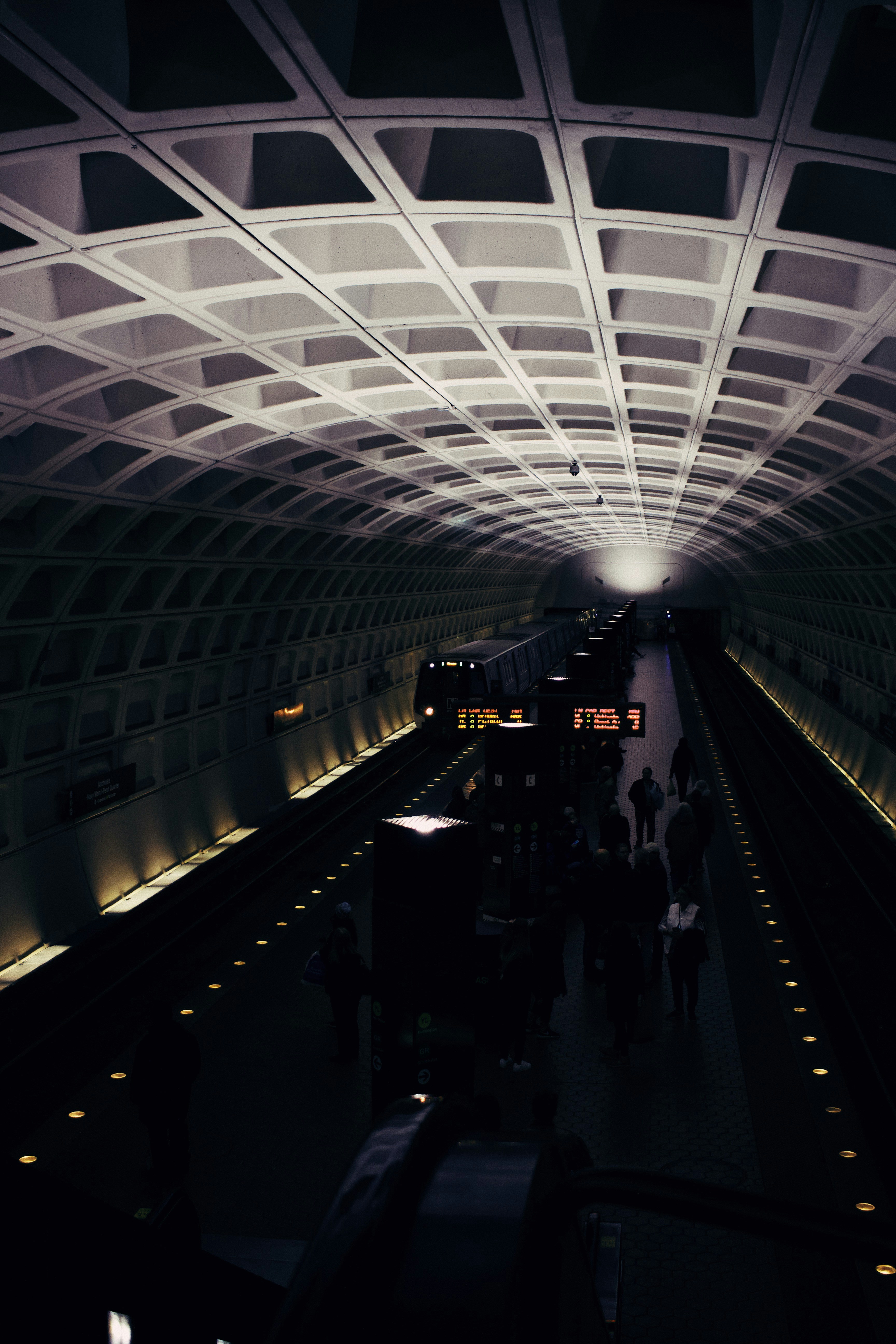 people walking on a train station