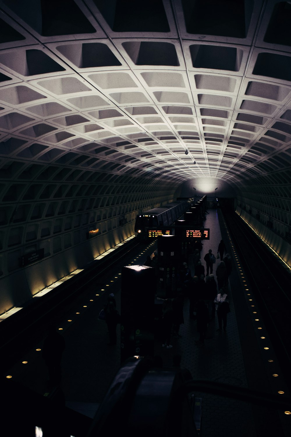 people walking on a train station