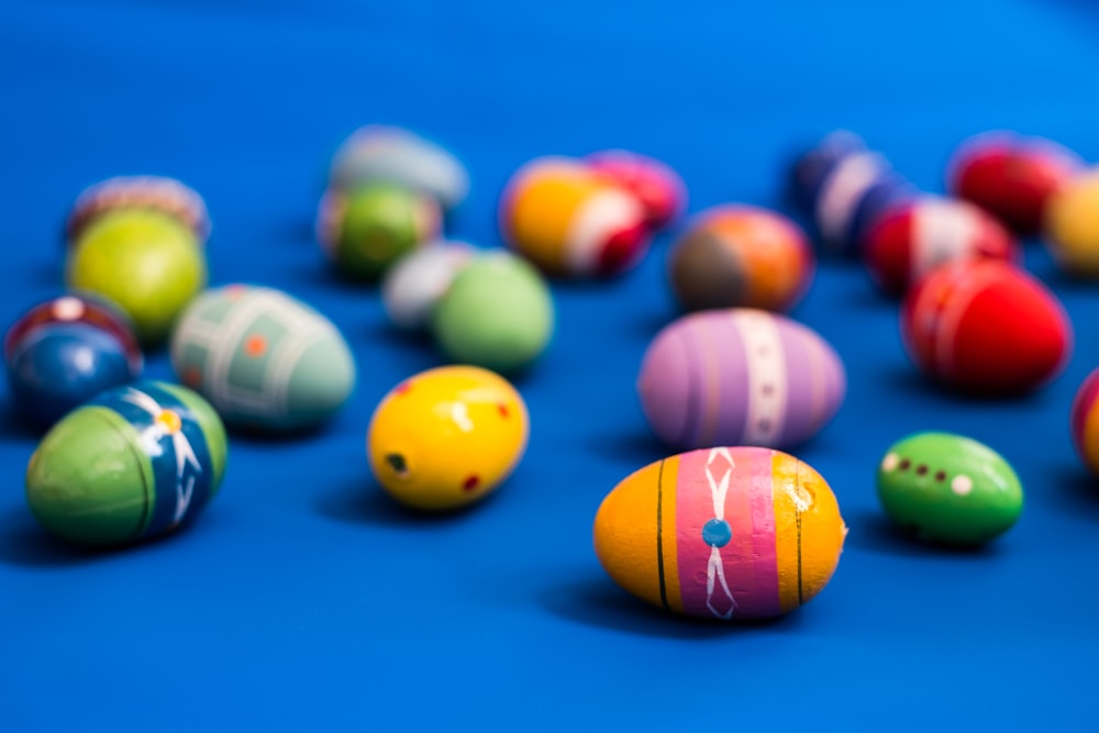 multi colored billiard balls on blue table