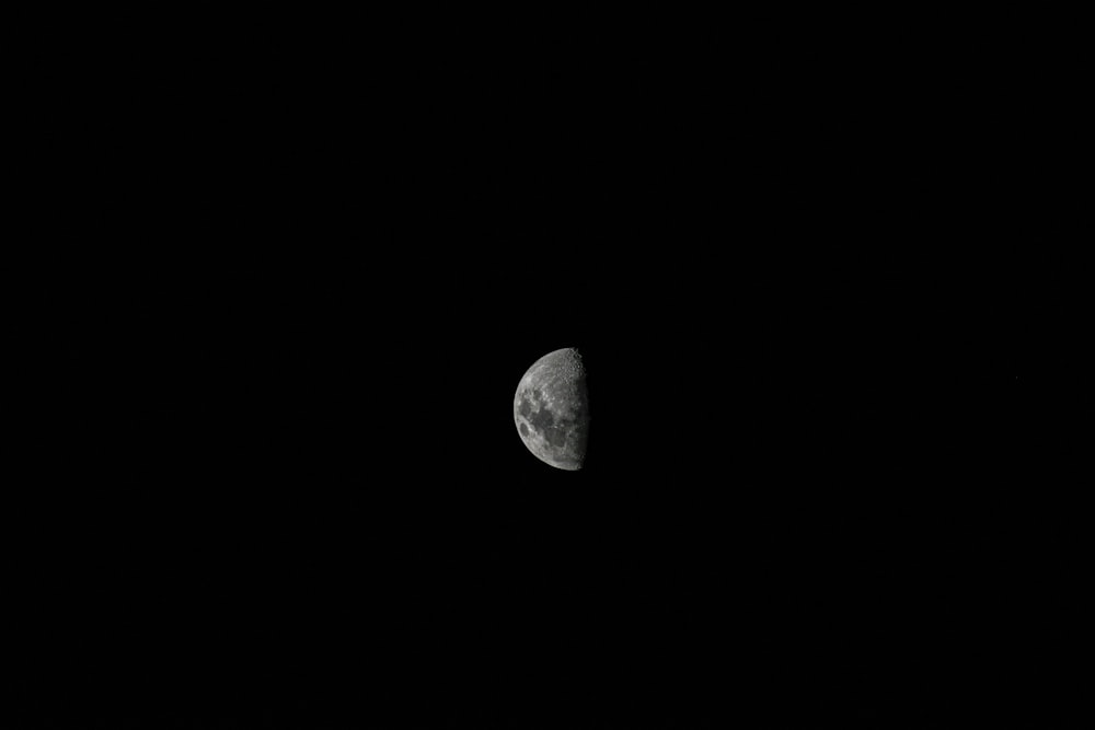 half moon in black background