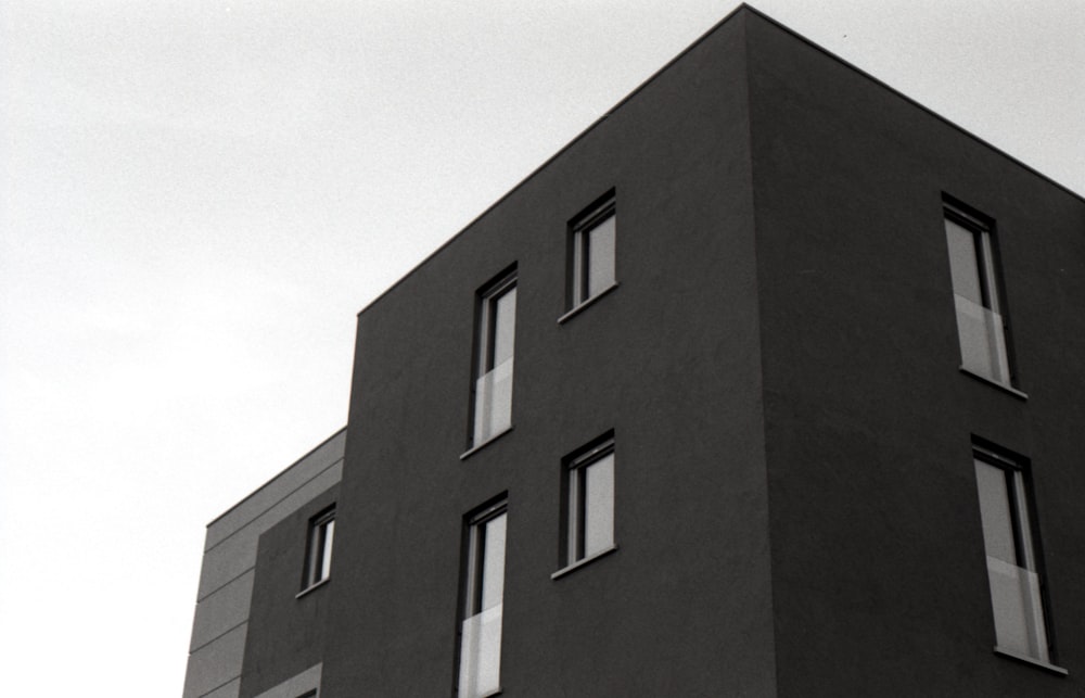 brown concrete building under white sky during daytime