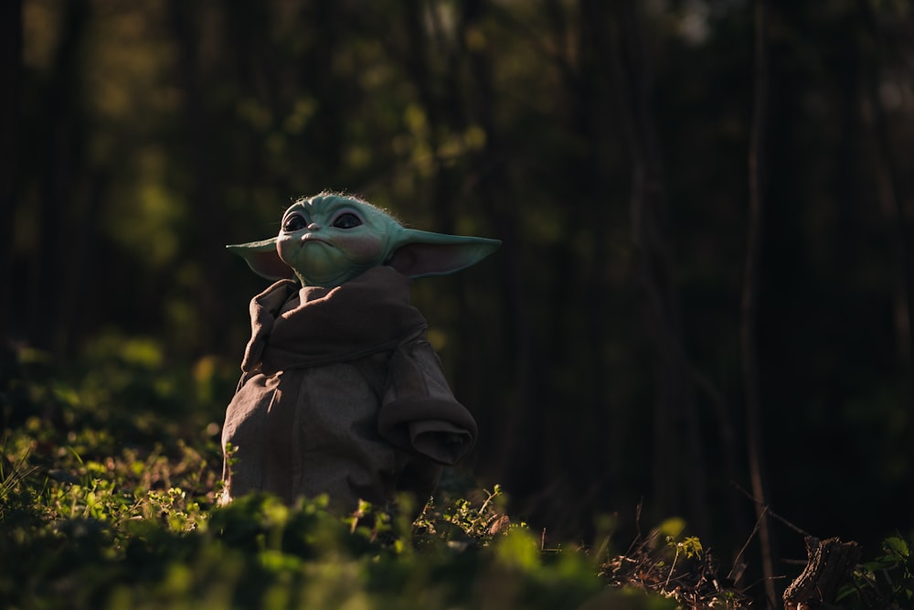 green bird on brown jacket