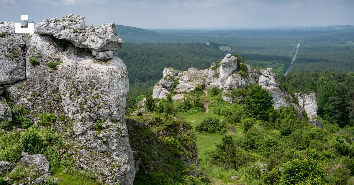 Gray rock formation on green grass field during daytime photo – Free ...