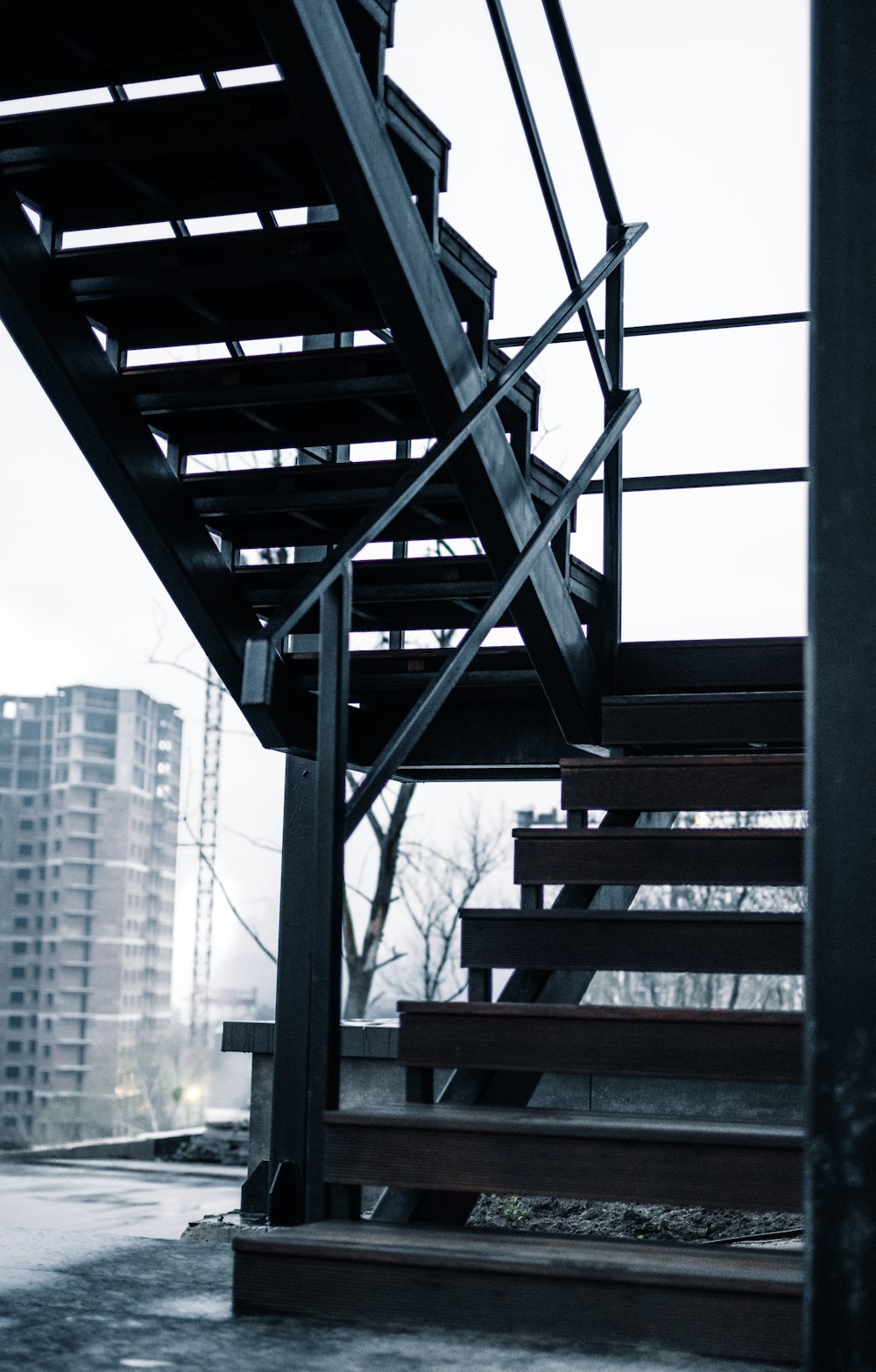 black metal frame near white concrete building during daytime