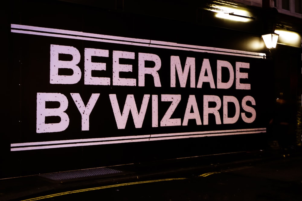 a sign that reads beer made by wizards