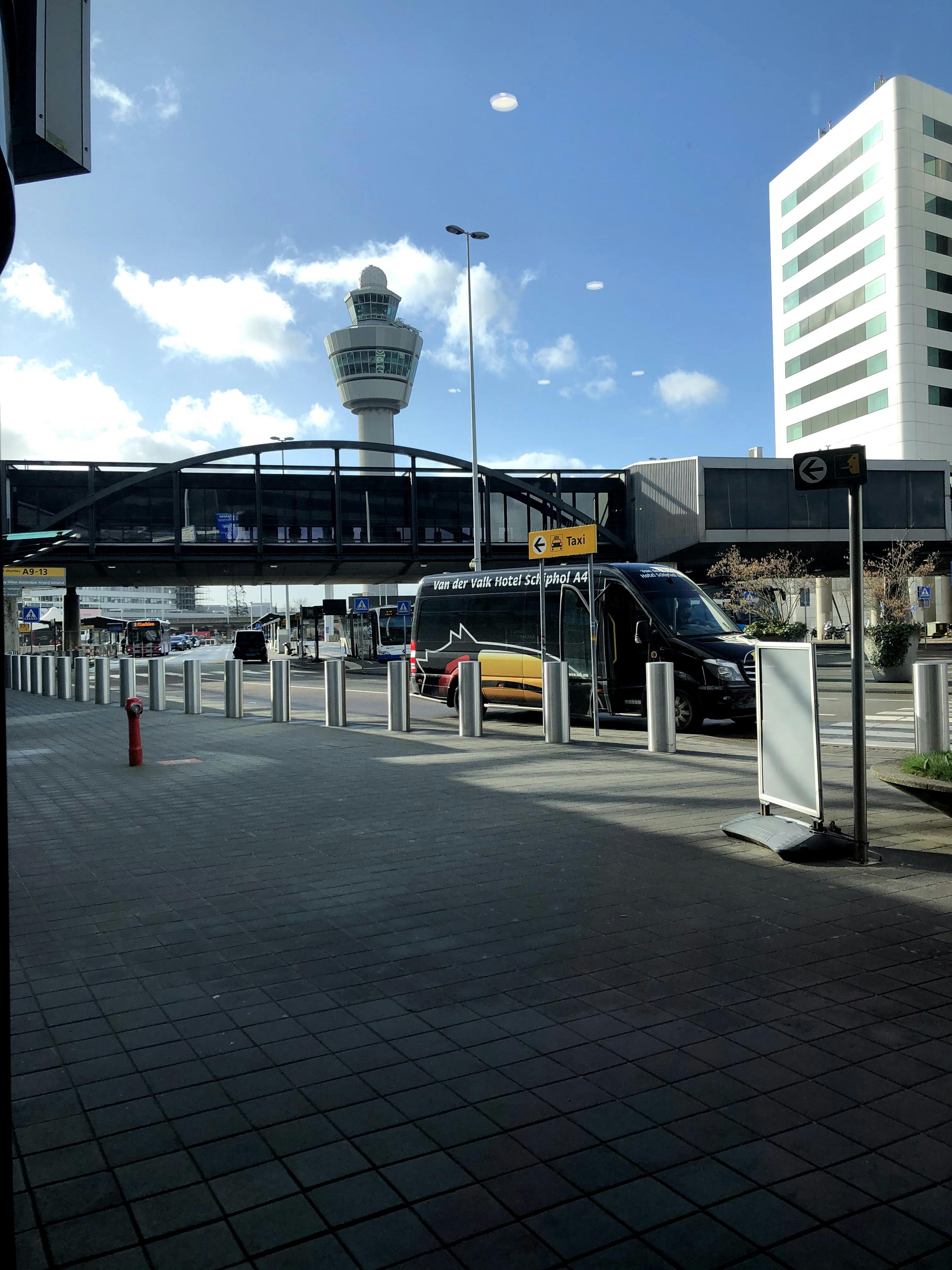 white and blue train on station during daytime