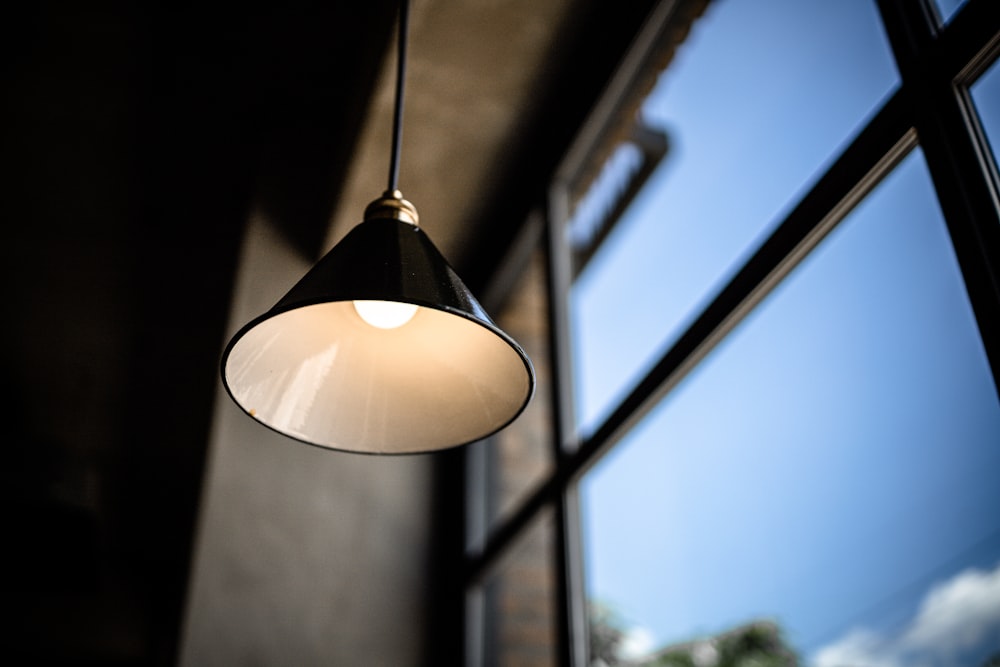 white pendant lamp turned on during night time