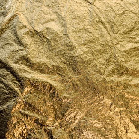 Artistic gold foil prints on premium paper.