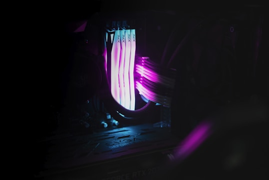 Close-up of premium computer components with purple and red accents displayed neatly.