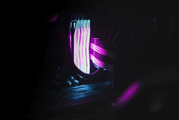 Close-up of a sleek CPU and RAM sticks arranged on a wooden desk with soft natural lighting