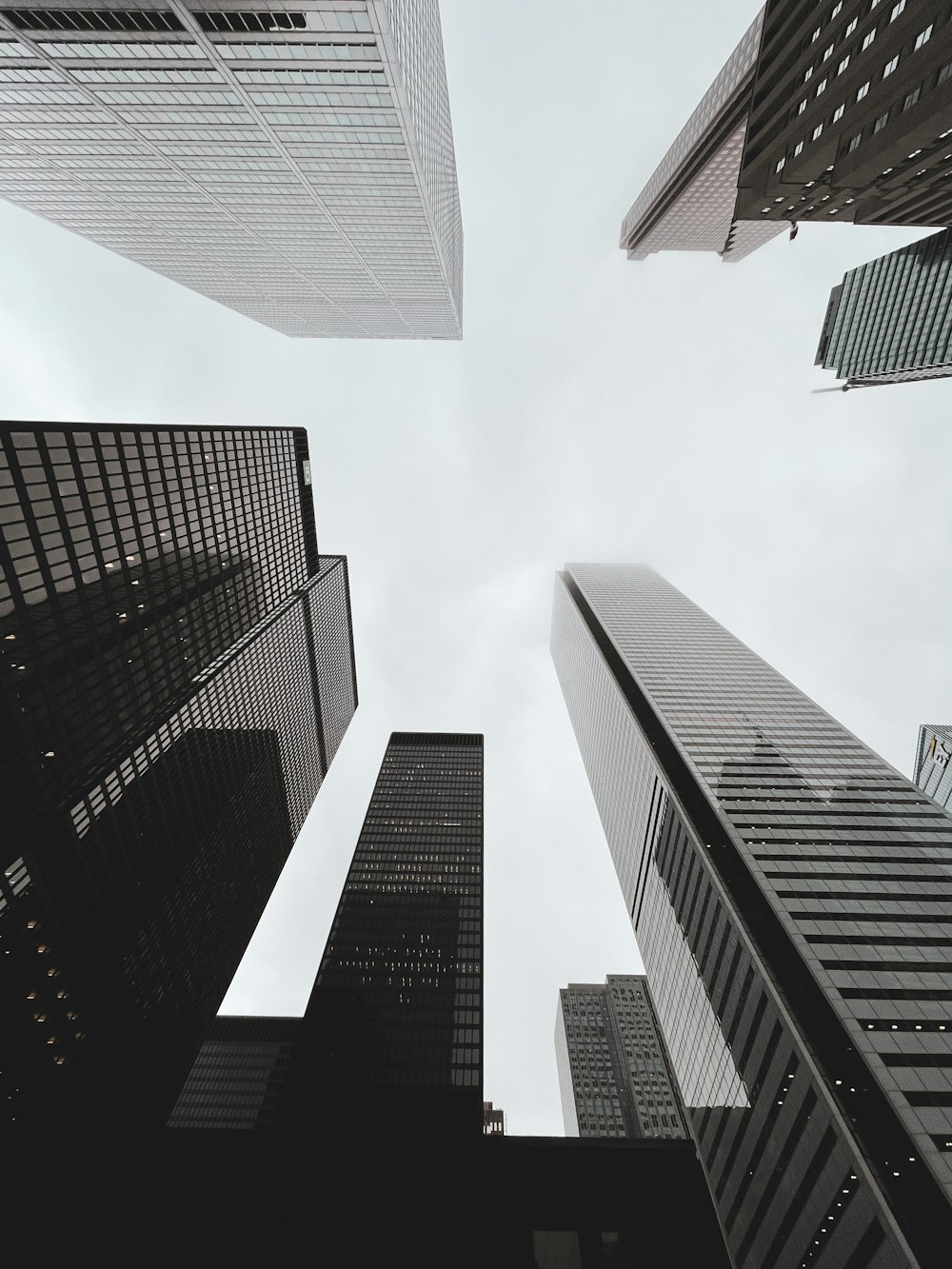 low angle photography of high rise buildings