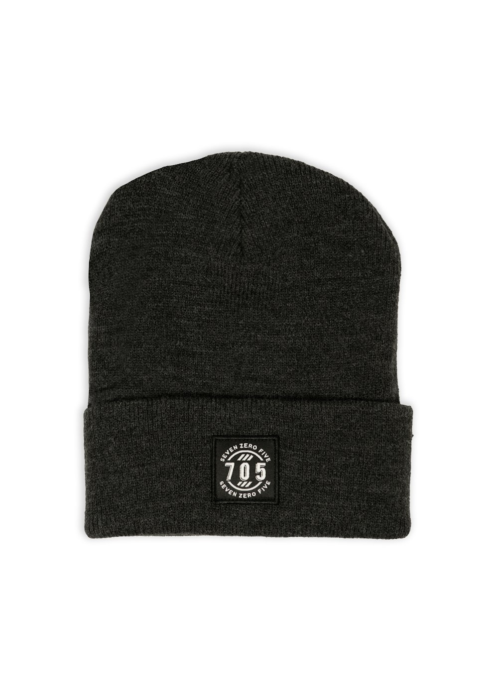 black knit cap on white surface