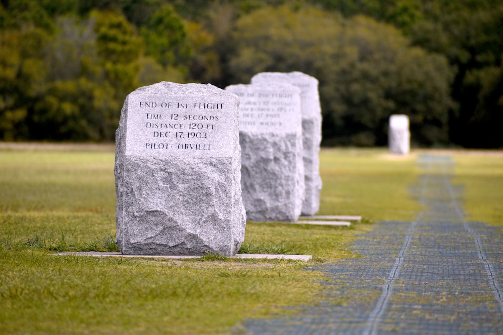 white stone on green grass field during daytime