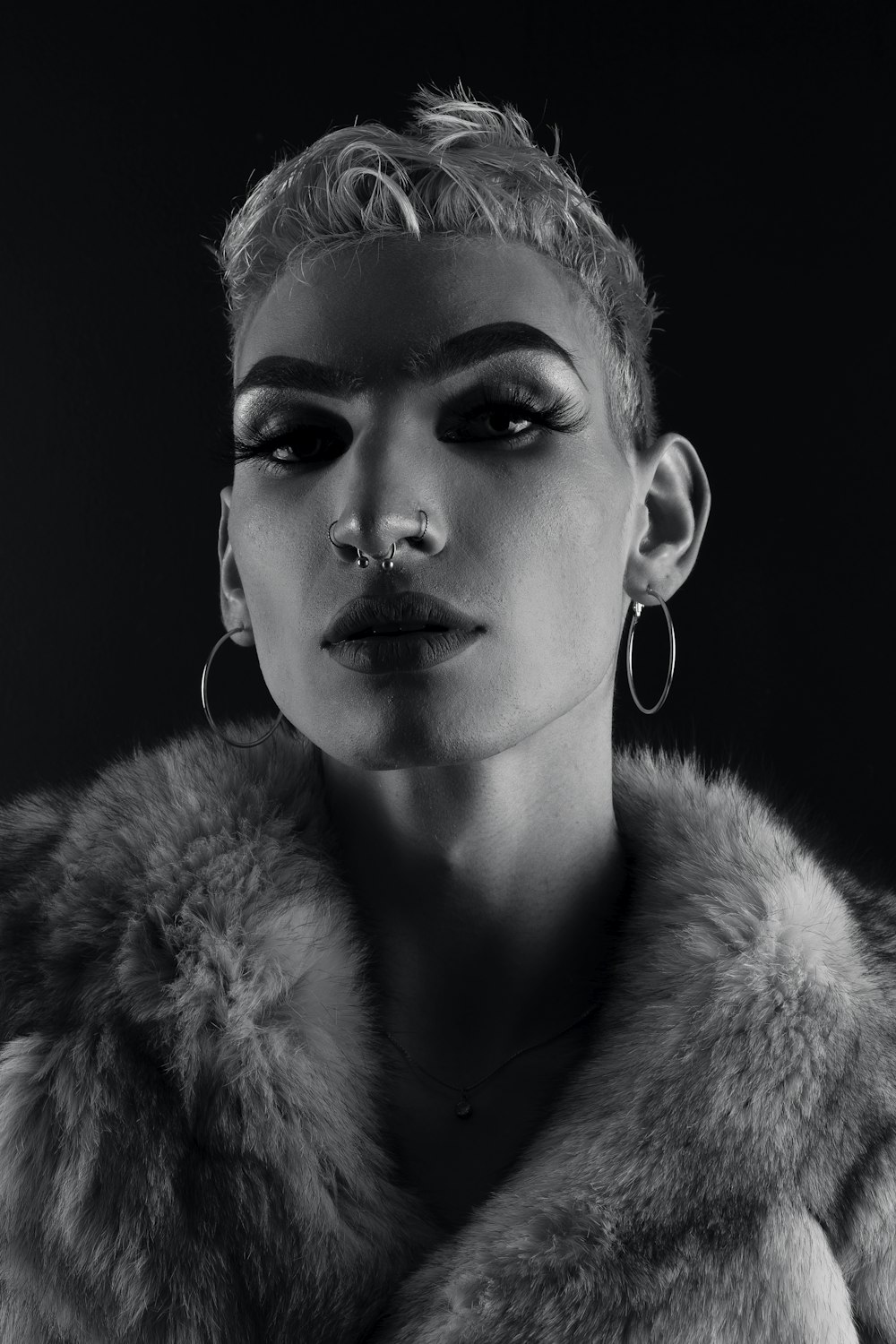 Fashion editorial photography with dramatic studio lighting