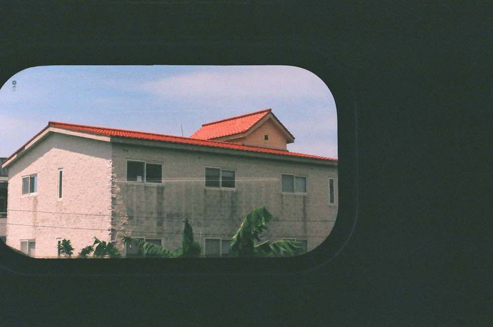 white and brown concrete house