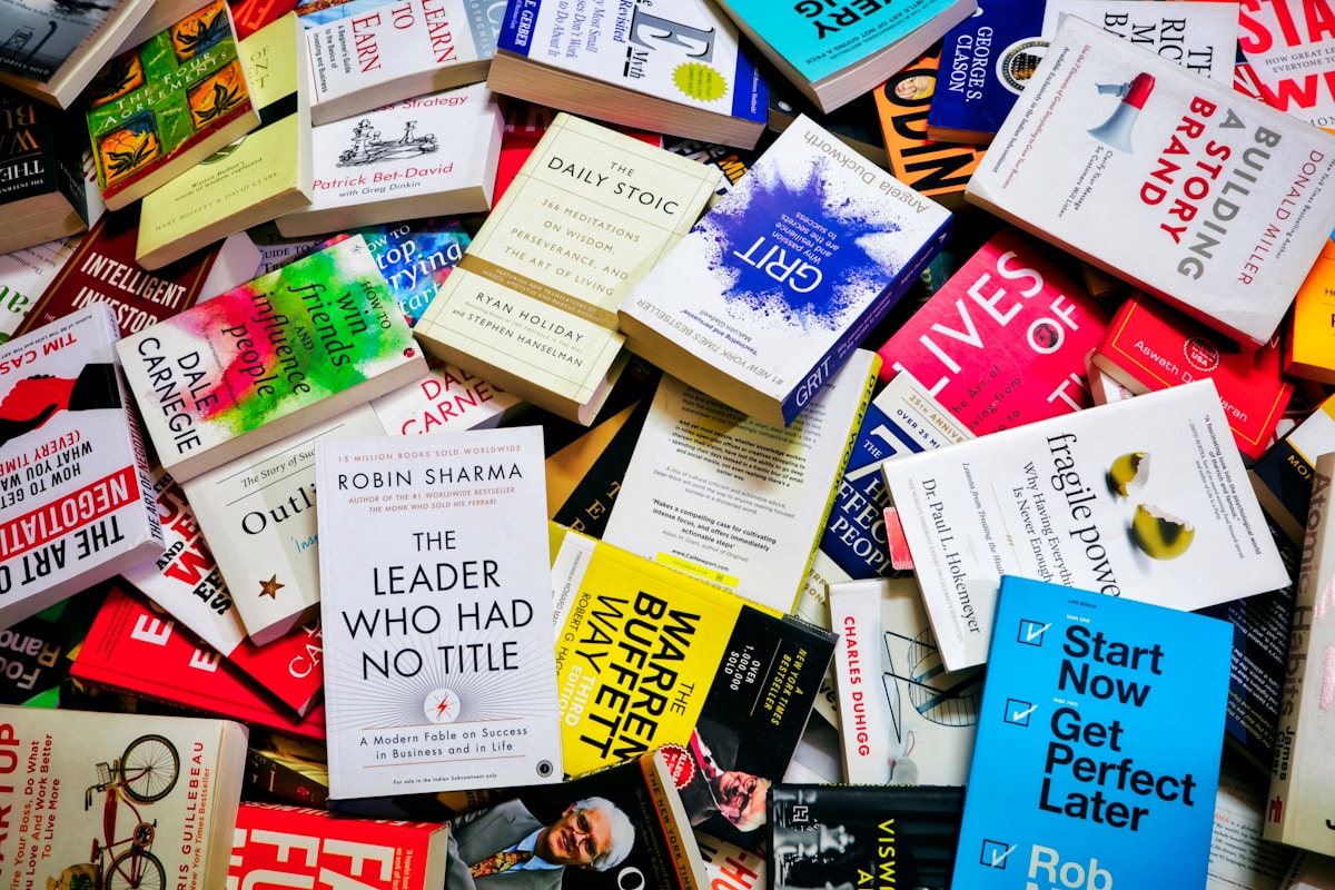 books in pile on floor