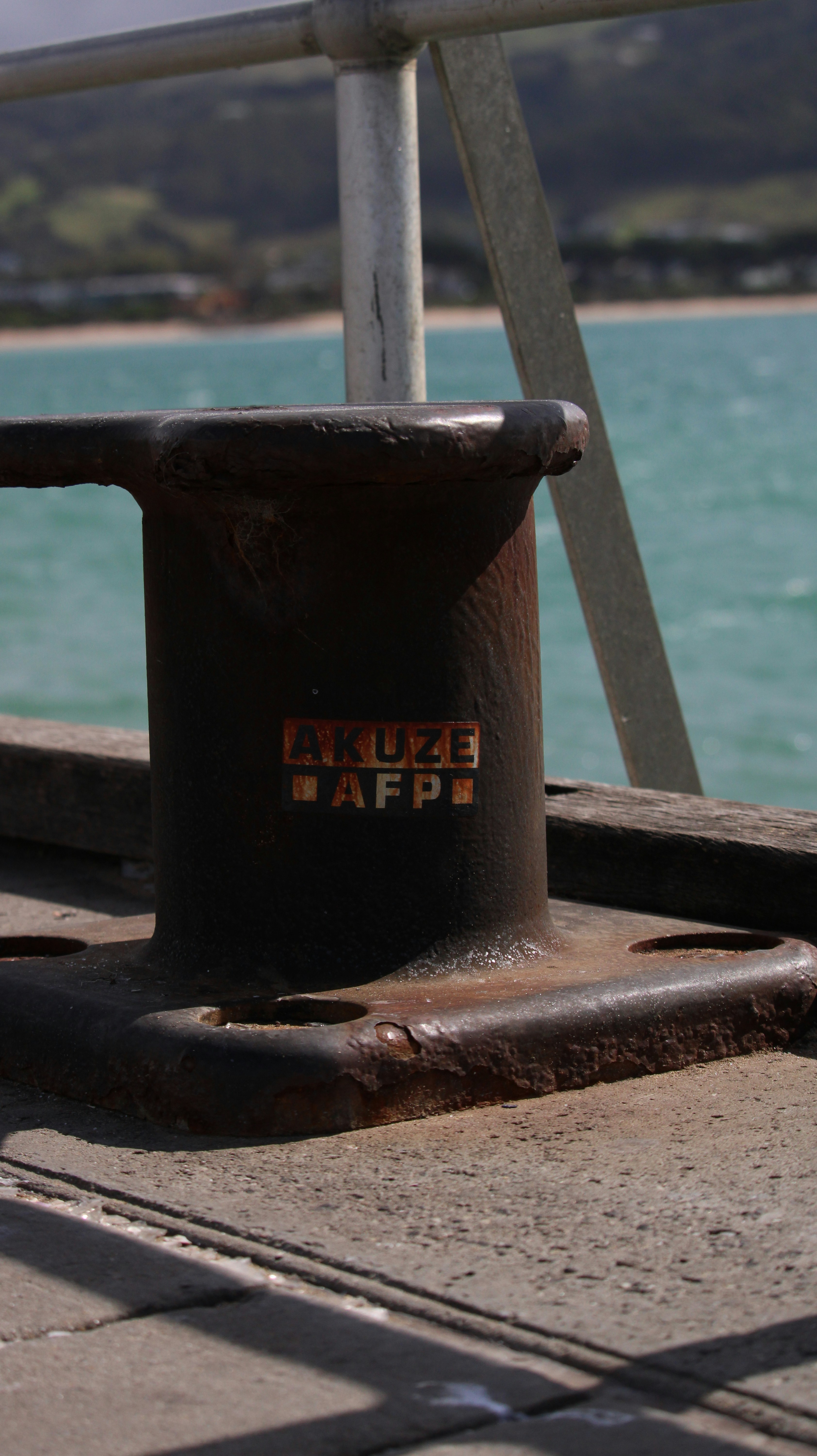 black metal pipe on gray metal railings