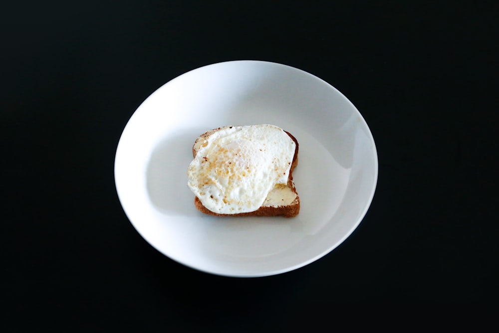 bread on white ceramic plate