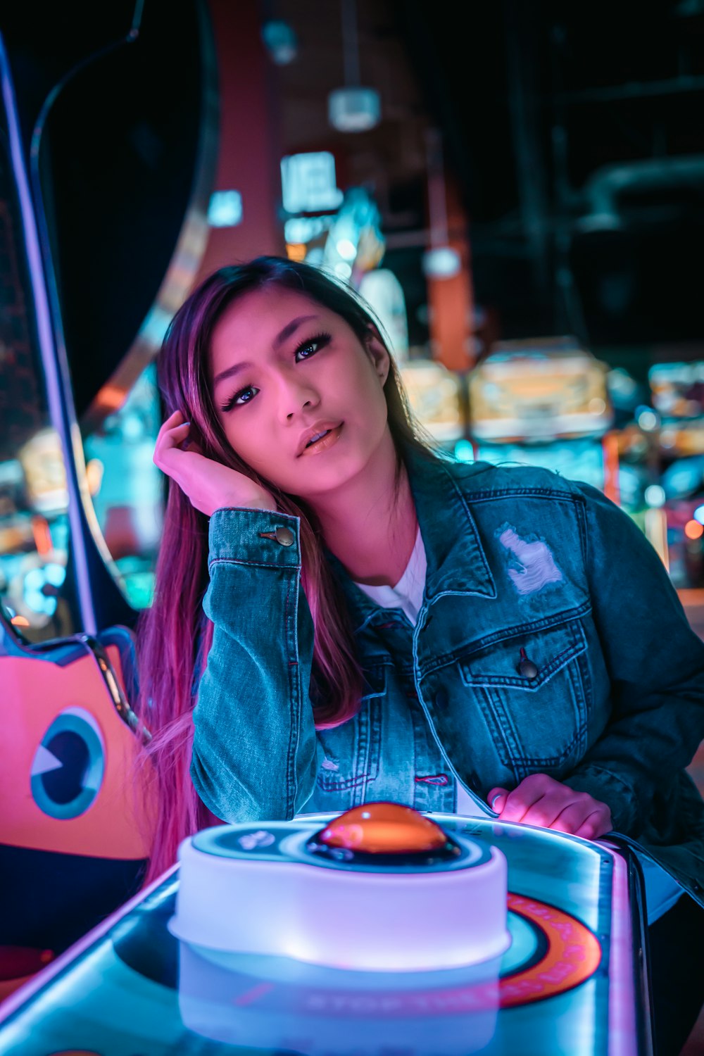 girl in blue denim jacket smiling