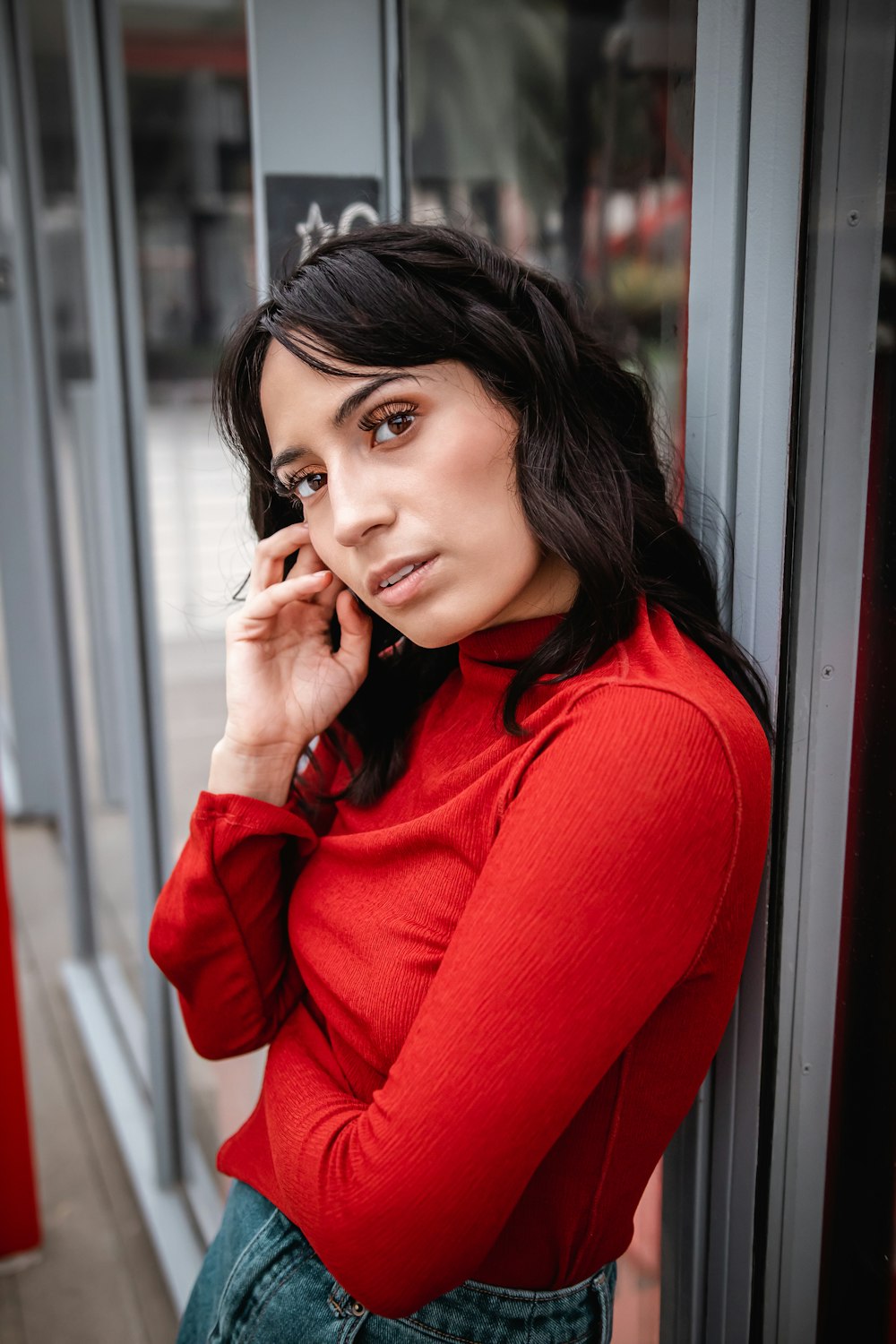 woman in red long sleeve shirt