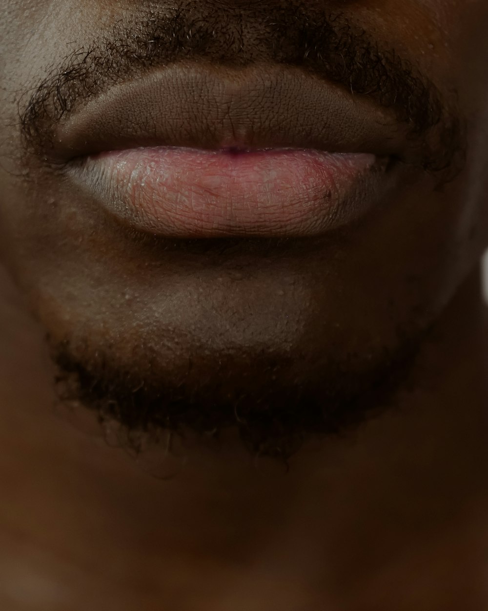 Männergesicht mit weißem Schnurrbart