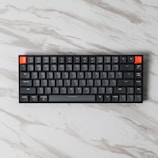 black and orange computer keyboard