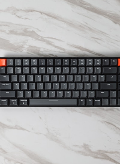 black and orange computer keyboard