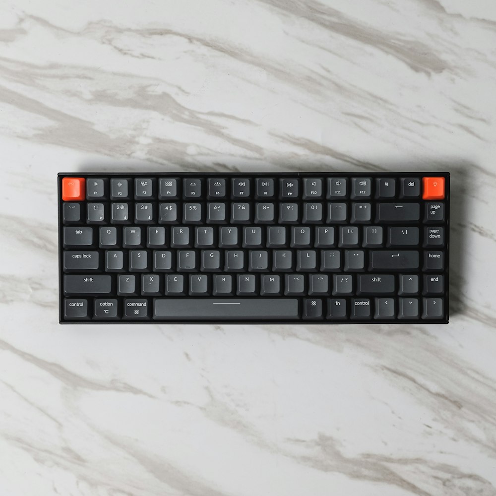 black and orange computer keyboard