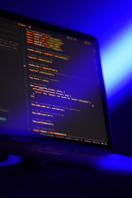 Glowing hologram panel displaying lines of code with smooth parallax motion in a cybernetic lab setting