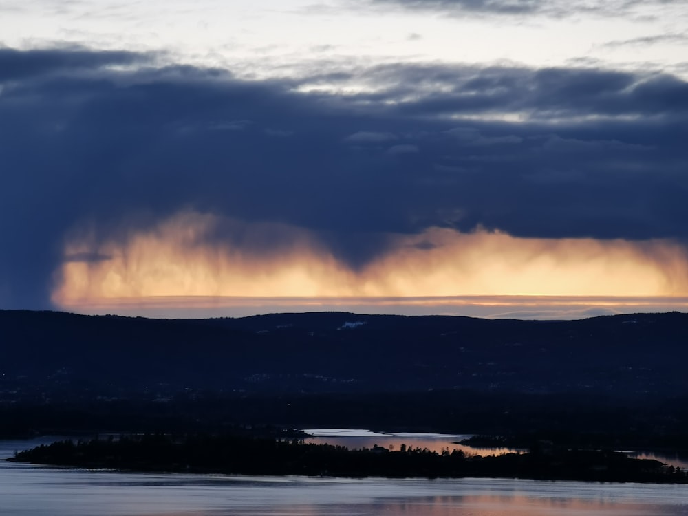 silhouette of mountain during sunset