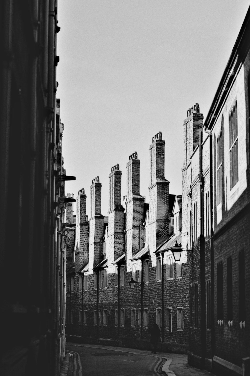 grayscale photo of city buildings