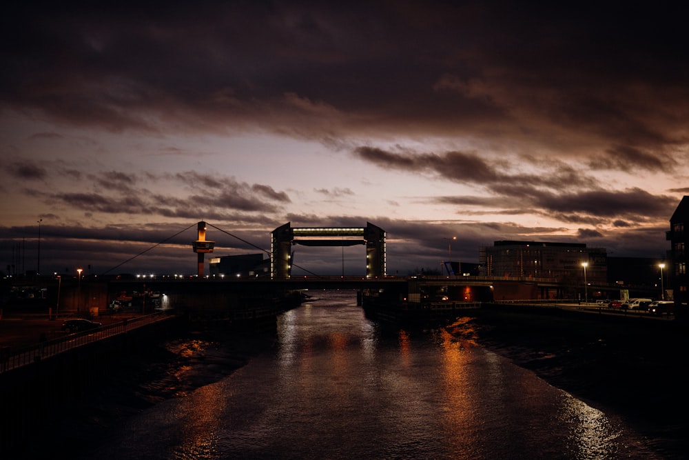 bridge over water during night time