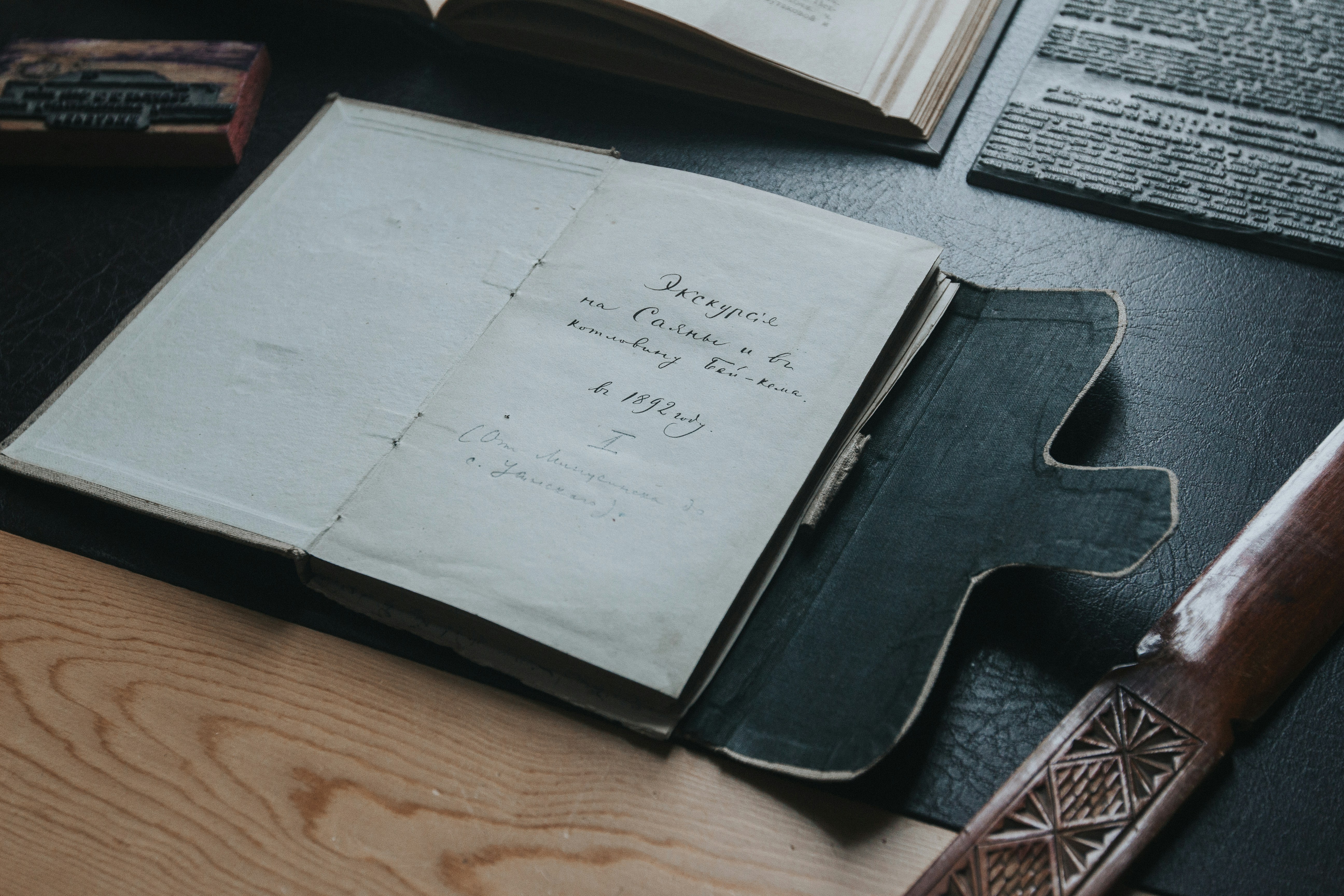 white printer paper on black tablet computer case