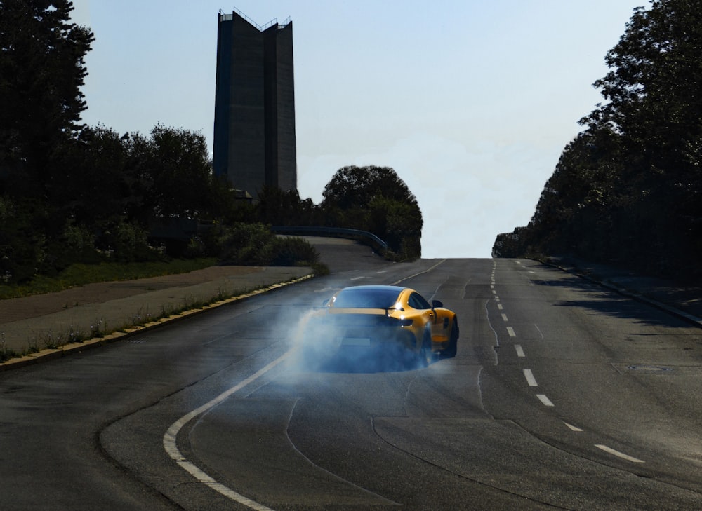 yellow and black sports car on road during daytime