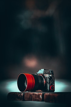 black and red dslr camera