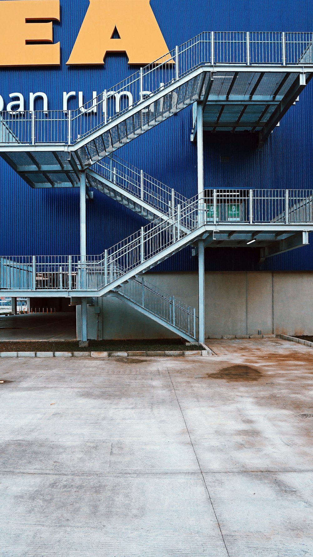 blue and white metal staircase