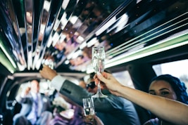 person holding clear wine glass