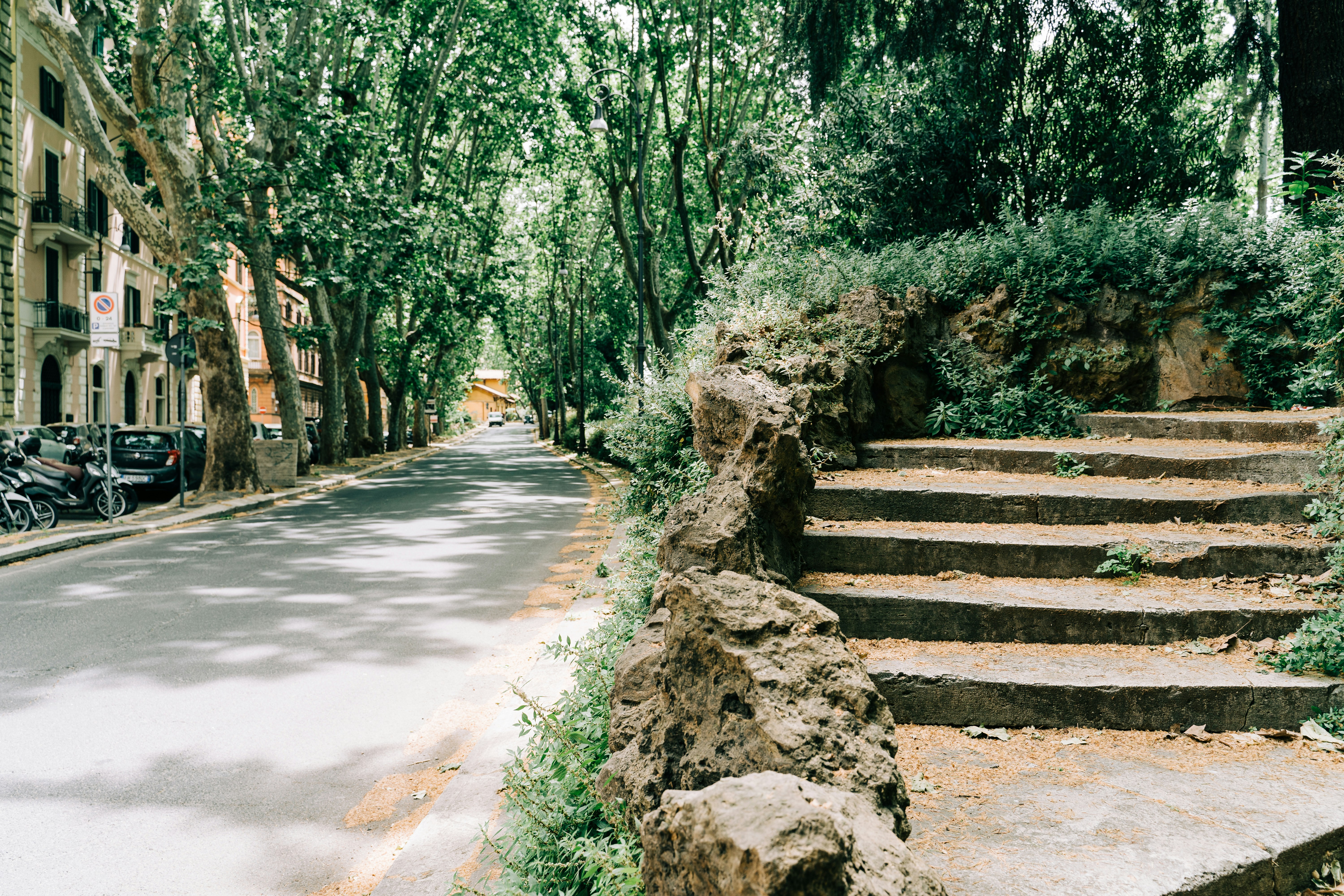 A view of an empty Via di Ripetta in Rome, with the stairs leading up to the Lungotevere