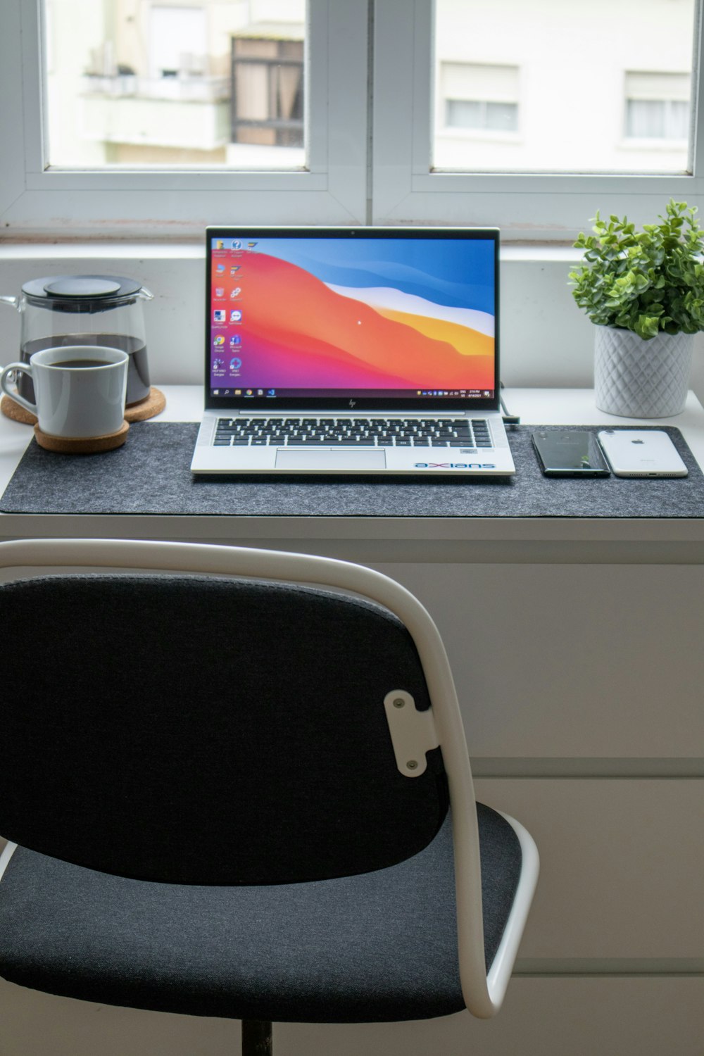 macbook pro on white table