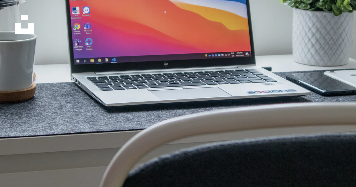 Macbook pro on white table photo – Free Technology Image on Unsplash