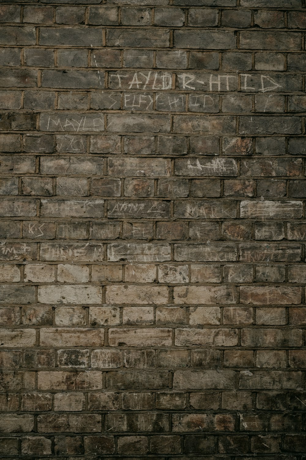 brown and grey brick wall