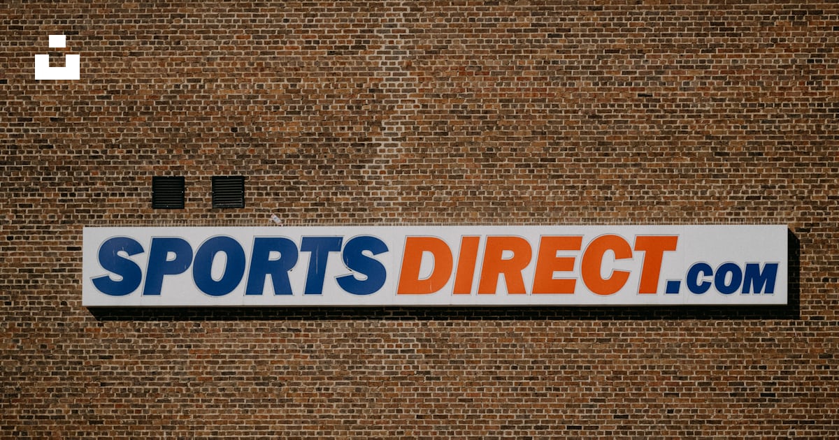 A sports direct sign on a brick wall photo – Free Typography Image on ...