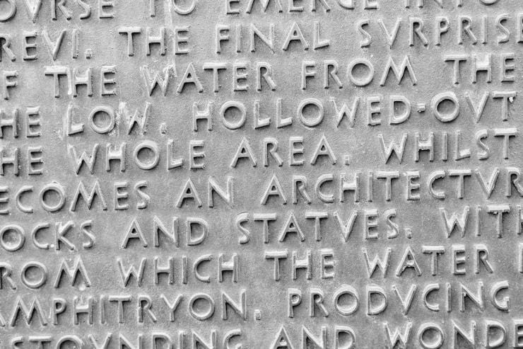 Sign in English explaining the history of the Trevi Fountain, Rome, Italy