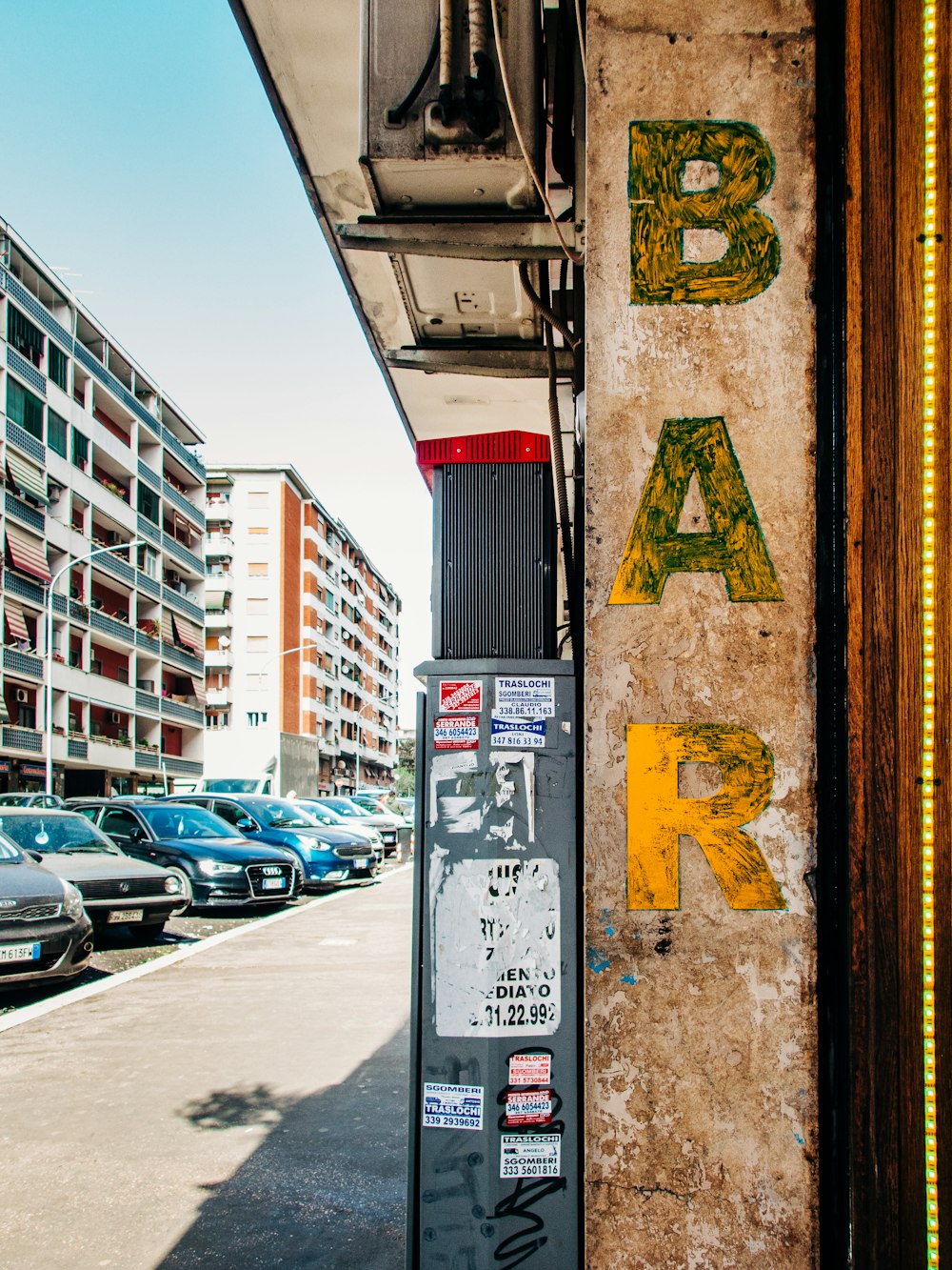 cars parked on side of the road during daytime