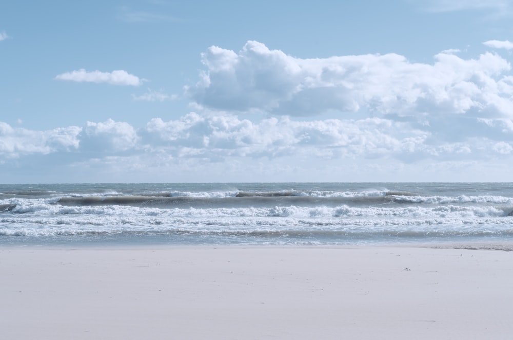 white clouds over the sea