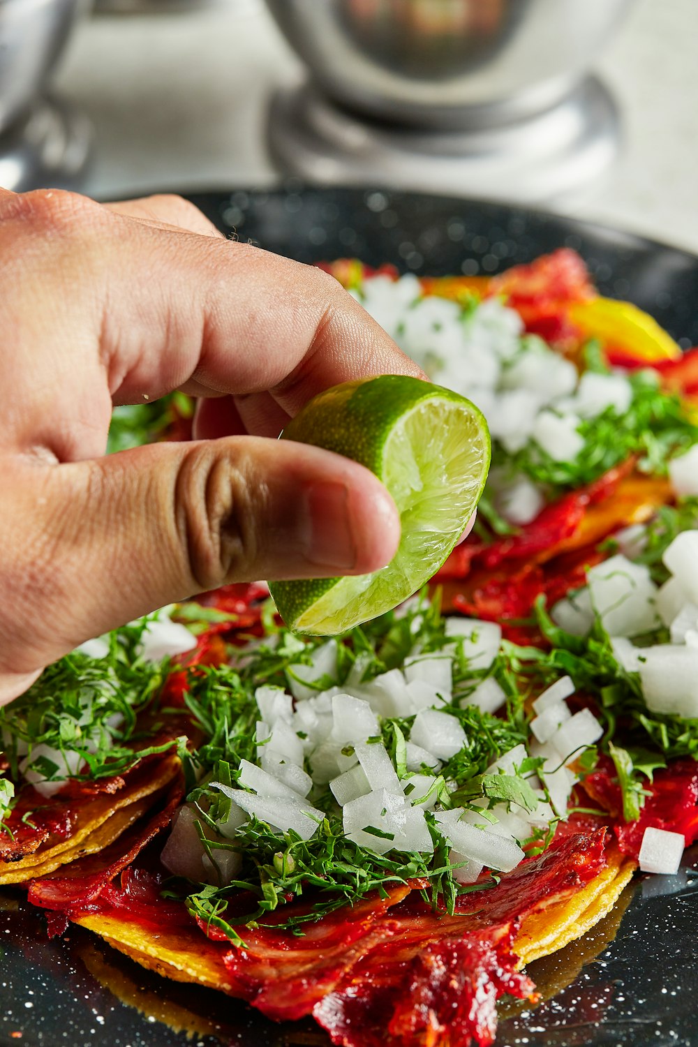 person holding green vegetable salad