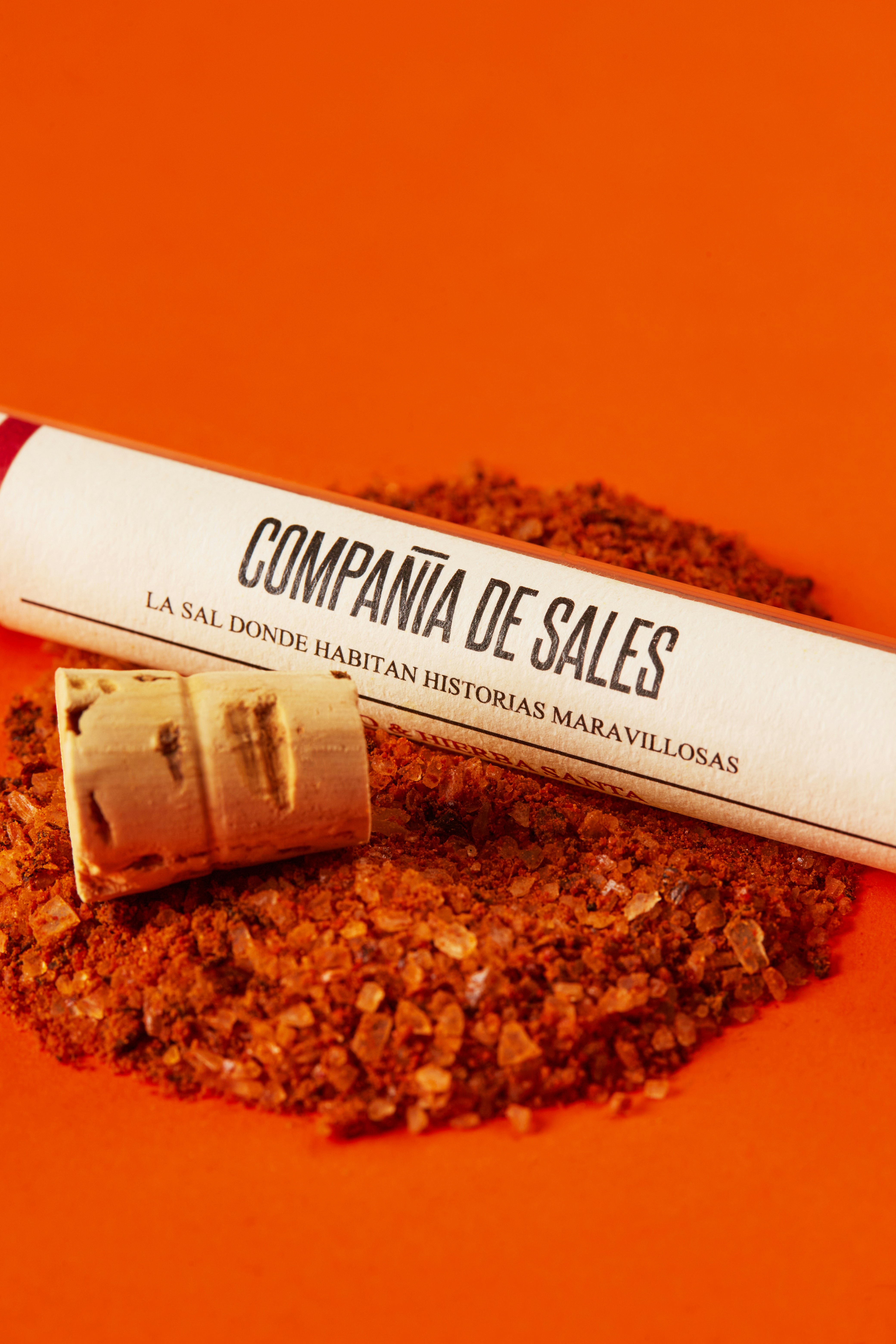 white and red tube bottle