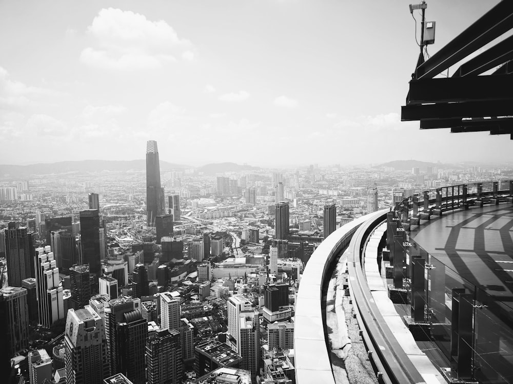 grayscale photo of city buildings